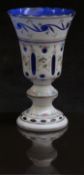 Bohemian overlaid glass vase with hand painted floral decoration, gilt banding and white casing over
