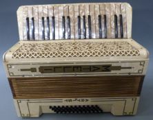 Mattelli 48 bass piano accordion in ivory pearloid finish, in original case