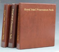 Three albums of GB presentation packs, high face value