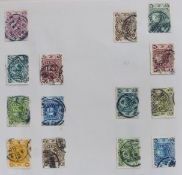 A collection of Chinese stamps in a ring binder and stockbook, including a good range of early