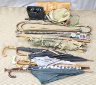 Quantity of sporting equipment and walking sticks including hallmarked silver mounted examples