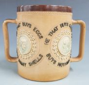 Florence Barlow for Royal Doulton motto stoneware loving cup with classical portrait cartouches, H