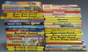 Thirty-nine western annuals including The Lone Ranger, Bonanza, Rawhide, Wagon Train, The High