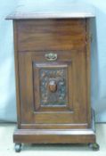Mahogany purdonium with lift up lid and tilt out front compartments, height 61cm