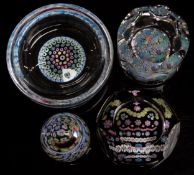 Four Whitefriars glass paperweights comprising Silver Jubilee faceted example with millefiori