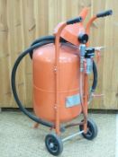 Pressure pot sand blaster on wheels