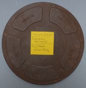 Two 16mm sound film reels, one Buster Keaton Chemist, the other the Three Stooges Halfwits Holiday