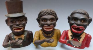 Three vintage novelty cast iron mechanical money boxes, two men, one with hat and a lady, tallest