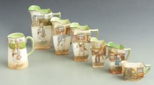 Collection of Royal Doulton Dickens Seriesware jugs including a set of graduated examples, tallest