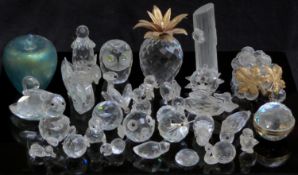 A collection of Swarovski and similar crystal animals including dolphins, hedgehog & koala, some