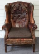 Leather Chesterfield wing back armchair