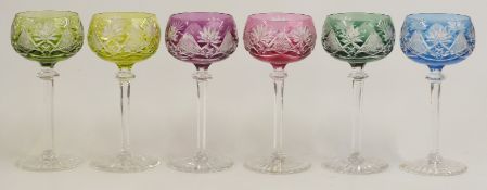 A set of six flash overlaid glass hock glasses all with cut decoration, octagonal stems and star cut