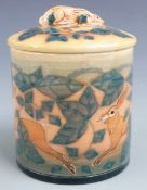 Dennis China Works covered jar decorated with hares