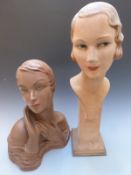 Two vintage haberdashery or shop display female heads or busts, one signed Reilaw, height of tallest