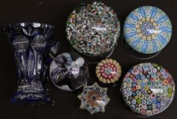 Six various glass paperweights, most with multi-coloured millefiori canes and one signed to base,