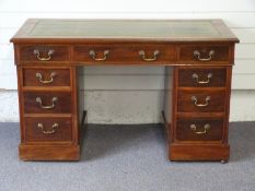 Mahogany leather inset twin pedestal desk fitted with nine drawers, W121 x D59 x H73cm