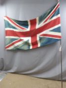 Vintage Union Jack flag on pole
