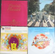 Approximately 50 albums and 12 twelve inch singles