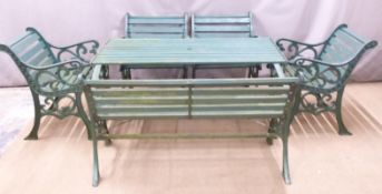 Cast iron wooden slatted garden furniture comprising table, bench and four chairs, length of table