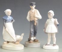 Three Royal Copenhagen / Bing and Grondahl figures, tallest 21cm