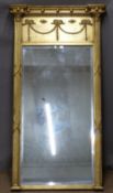 Bevelled edge gilt framed mirror with swag decoration, overall size 127 x 69cm