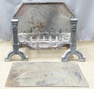 A cast iron fire back, grate and andirons, width of grate 60cm