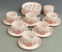 A collection of Hornsea cups and saucers decorated in the Passion pattern