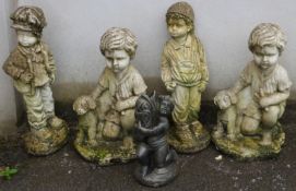 Five statues of children, height of largest 48cm