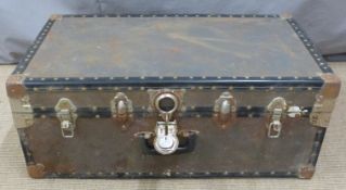 Embossed brass blanket box or similar, width 90cm together with a travelling trunk