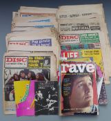 A collection of mixed music related publications including Rolling Stones book, Rave, Disc and Music
