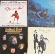 Approximately 50 albums of mixed genres