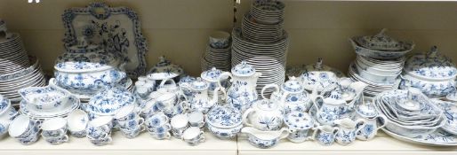 An extensive collection of Meissen blue and white dinner, tea and decorative ware including Onion