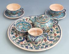 Turkish Iznik style pottery tea for two on a circular tray, diameter 32cm