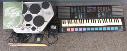 Yamaha DD-55 Digital Percussion kit in original box, together with a PSS-780 Portasound keyboard