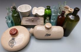 A collection of medicine and similar bottles including Yorkshire Relish, Veno's cough cure, Hewitts,