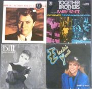 Approximately 90 albums of mixed genres plus twelve inch singles