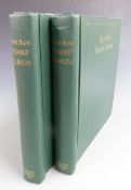 Two volumes of Stanley Gibbons New Age stamp albums, Commonwealth QEII stamps