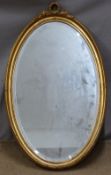 Bevelled edge gilt framed oval mirror, overall height 80cm