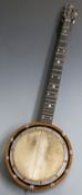 A c1920s 5 string zither banjo with brass and bone machine heads and 19