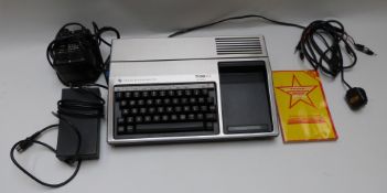 Texas Instruments TI - 99/4A computer with accessories and handbook