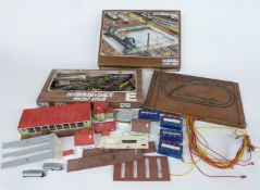 A collection of Marklin and similar Z gauge locomotives, rolling stock, buildings, track and