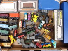 Eleven Dapol, Hornby and similar 00 gauge wagons together with four empty boxes and a collection