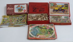 Five vintage wooden jigsaws including Victory, Tuck's and Zig Zag together with an Airfix Robins