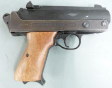 Record Jumbo .177 air pistol with walnut grips and adjustable sights, serial number 10792.