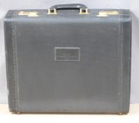 Salesman sample attache case for Charles Jourdan L'Insolent perfume with related ephemera