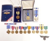 Thirteen United States military commemorative medals etc
