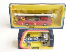 Two Corgi diecast model vehicles Simon Snorkel Dennis fire engine 1126 and Team Surtees T.S.9.