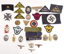 Replica Nazi German badges and insignia to include armband, enamel Olympic pendant, SS dagger