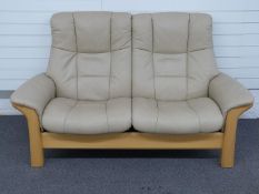 Ekornes leather two seat reclining sofa, W174 x D86 x H96cm