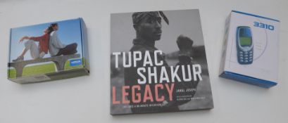 Two Nokia mobile phones 3210 and 3310 both in original boxes together with Tupac Shakur Legacy